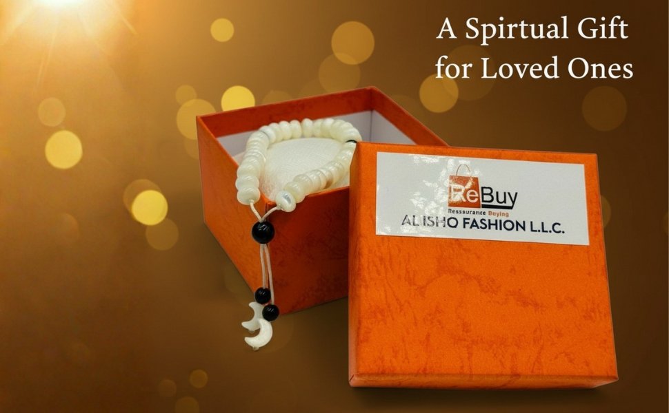 The Mother of Pearl tasbih bracelet showcased inside its premium textured orange gift box layout